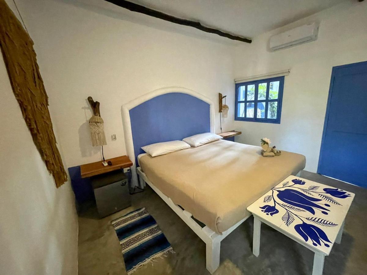 Mio Tulum Hotel Boutique Exterior foto A bedroom in a hotel in Oaxaca, Mexico