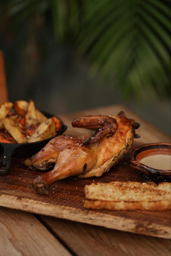 Mio Tulum Hotel Boutique Exterior foto A half chicken